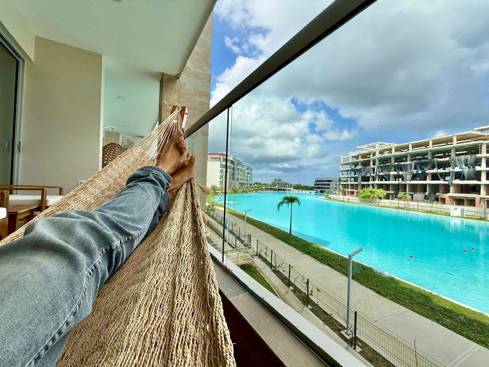 The turquoise crystal lagoon and the towers seen from a private balcony in Cartagena